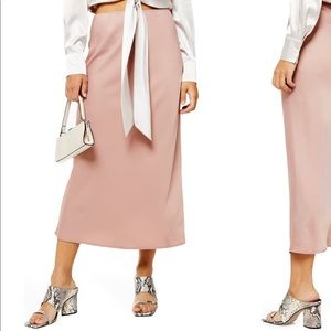 Pastel pink matte satin skirt from work to play!
